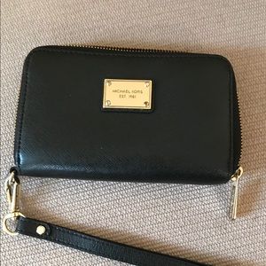 SOLD. Small wristlet Michael Kors Black